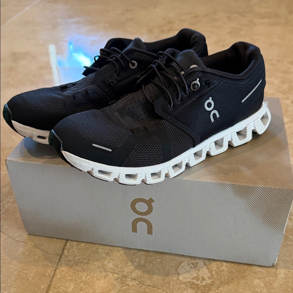 On Running Black and White Athletic Shoes